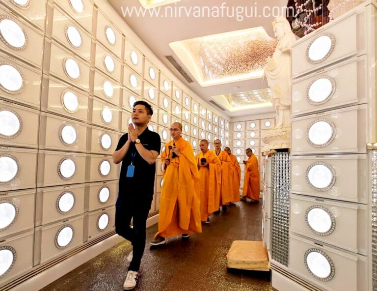 Buddhist priests doing the ritual to bless the residents at Nirvana Memorial Garden