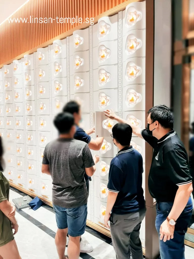 The urn interment procedures in the columbarium of Lin San Temple