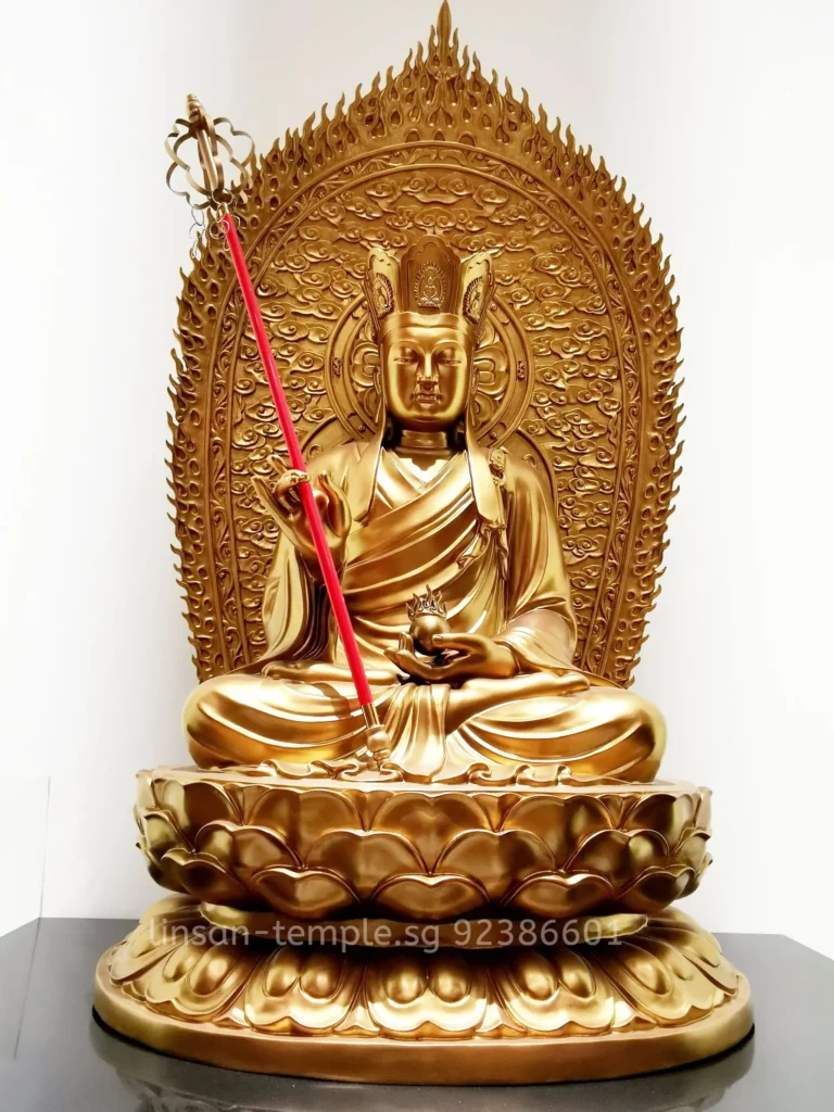 Buddha Statue next to ancestral tablets